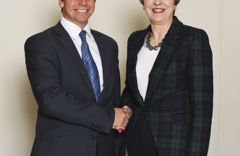 Nigel Huddleston and Theresa May