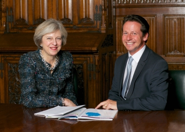 Nigel Huddleston with Theresa May