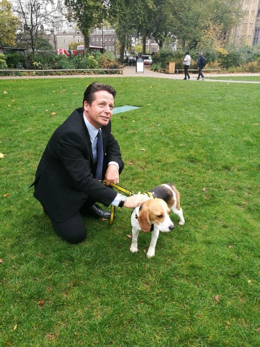 Nigel Huddleston MP with a Dogs Trust dog - Bonnie - at Westminster Dog of the Year